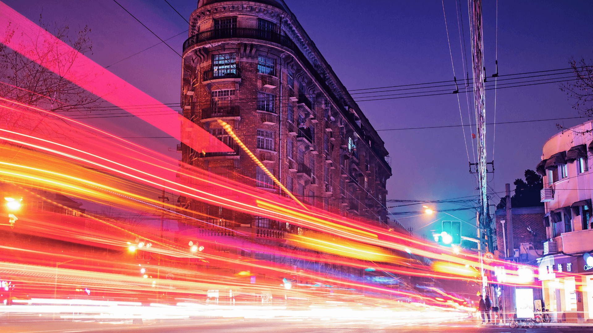 Business Intelligence Augmentation: timelapse lights during the night time in an urban environment.